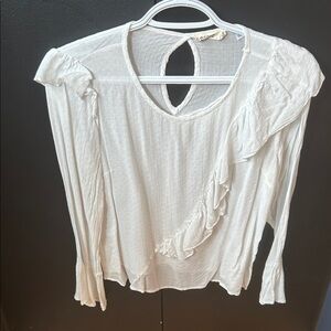 Essue white Blouse with Ruffle Accent. Size medium.